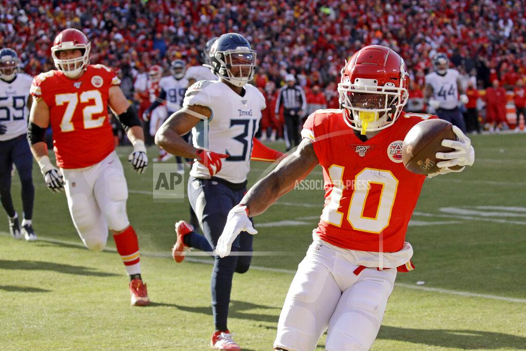 Charlie Riedel Kansas City Chiefs' Tyreek Hill (10) runs for a touchdown during the first half of the NFL AFC Championship football game against the Tennessee Titans Sunday, Jan. 19, 2020, in Kansas City, MO. (AP Photo/Charlie Riedel)