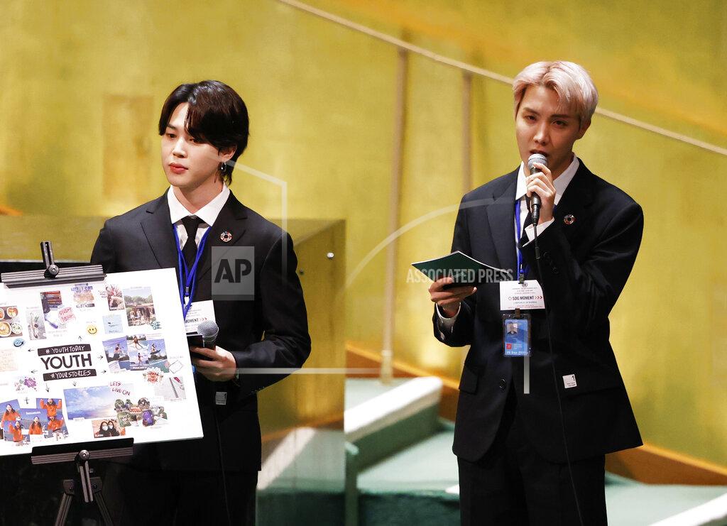 John Angelillo ADDS IDS - Members of South Korean K-pop band BTS, Jimin, left, and J-Hope speak at the United Nations meeting on Sustainable Development Goals during the 76th session of the U.N. General Assembly at U.N. headquarters on Monday, Sept. 20, 2021. (John Angelillo/Pool Photo via AP)
