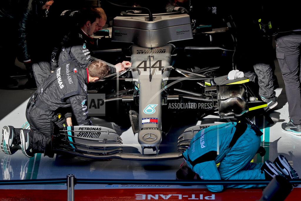 Joan Monfort Mercedes-AMG Petronas' Lewis Hamilton makes a pit stop during a Formula One pre-season testing session at the Barcelona Catalunya racetrack in Montmelo, outside Barcelona, Spain, Wednesday, Feb. 19, 2020. (AP Photo/Joan Monfort)