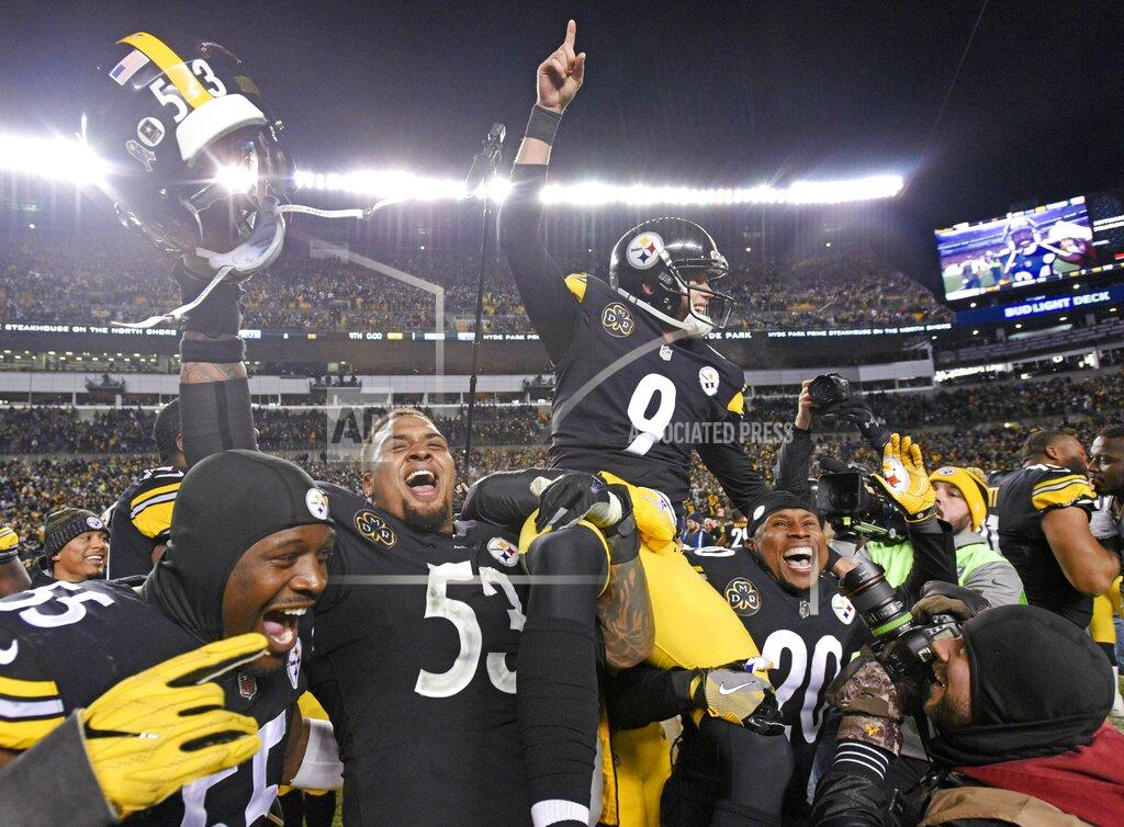 Don Wright FILE - In this Nov. 26, 2017, file photo, Pittsburgh Steelers kicker Chris Boswell (9) is carried off the field after kicking the game-winning field goal against the Green Bay Packers in Pittsburgh. The Steelers kicker knows his underwhelming 2018 season directly contributed to the Steelers missing the playoffs. Yet rather than reinvent his offseason routine, he doubled down confident, he could bounce back. (AP Photo/Don Wright, File)