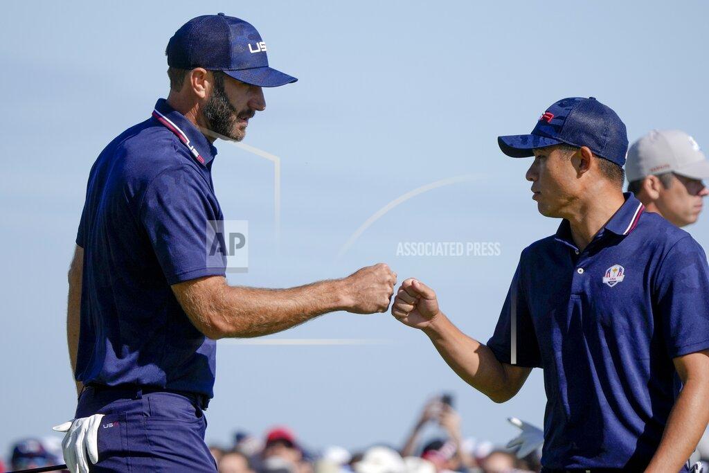 Charlie Neibergall Team USA's Dustin Johnson and Team USA's Collin Morikawa celebrate on the 15th hole during a foursomes match the Ryder Cup at the Whistling Straits Golf Course Saturday, Sept. 25, 2021, in Sheboygan, Wis. (AP Photo/Charlie Neibergall)