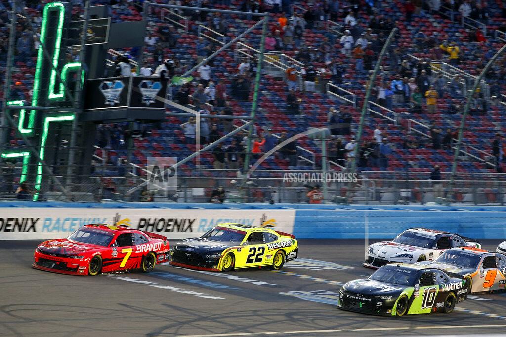 Ralph Freso Justin Allgaier (7), Austin Cindric (22) and Ross Chastain (10) lead the field on a restart during the NASCAR Xfinity Series auto race at Phoenix Raceway, Saturday, Nov. 7, 2020, in Avondale, Ariz. (AP Photo/Ralph Freso)