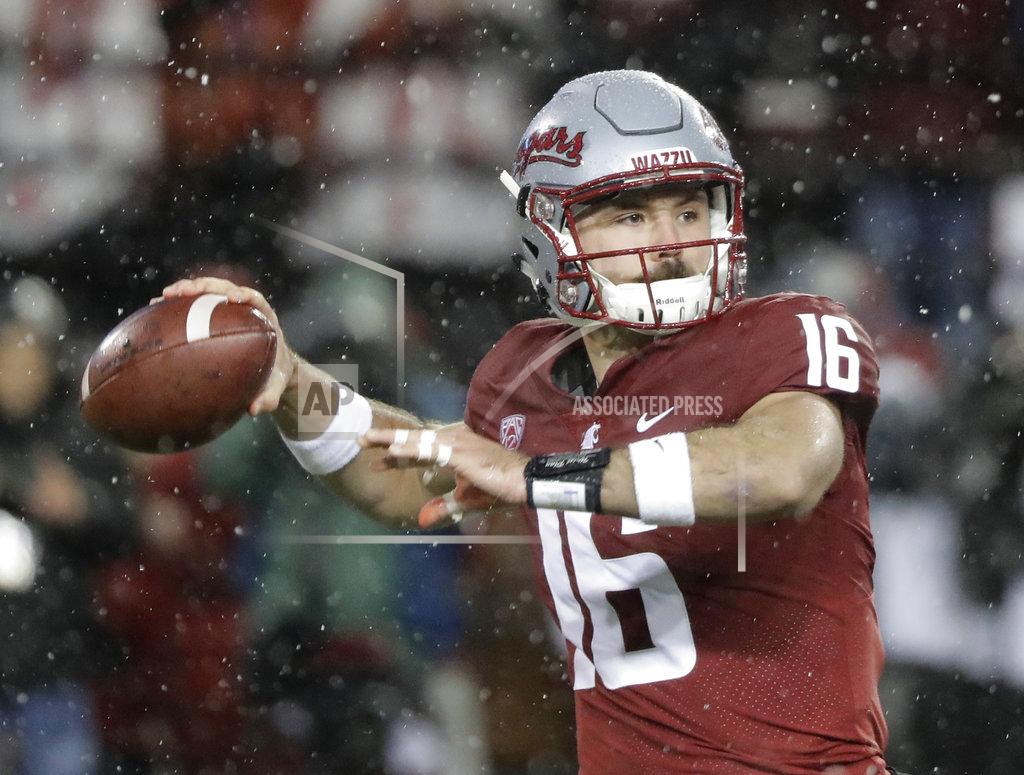 Ted S. Warren Washington State quarterback Gardner Minshew passes against Washington during the first half of an NCAA college football game, Friday, Nov. 23, 2018, in Pullman, Wash. (AP Photo/Ted S. Warren)