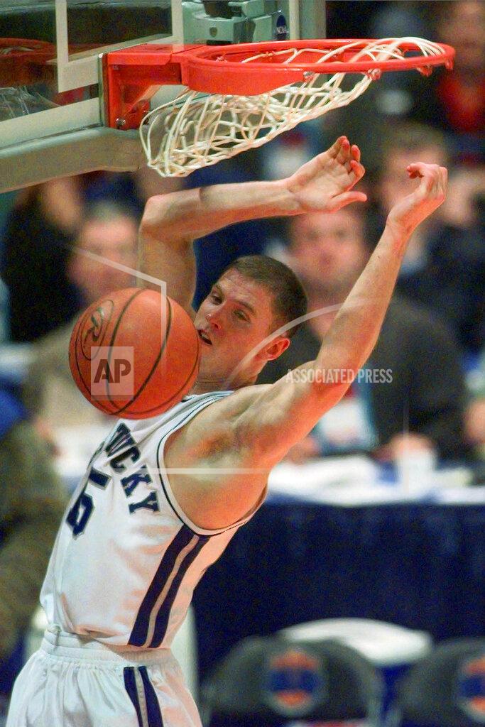 Lm Otero FILE - In this March 30, 1998, fele photo, Kentucky's Jeff Sheppard (15) dunks in the second half of the NCAA men's Final Four championship game against Utah, in San Antonio. Sheppard works as a financial planner now and is over two decades removed from the time he helped Kentucky win the NCAA Tournament. Yet he still gets asked regularly about his role in the Wildcats’ 1998 national championship. (AP Photo/LM Otero, File)