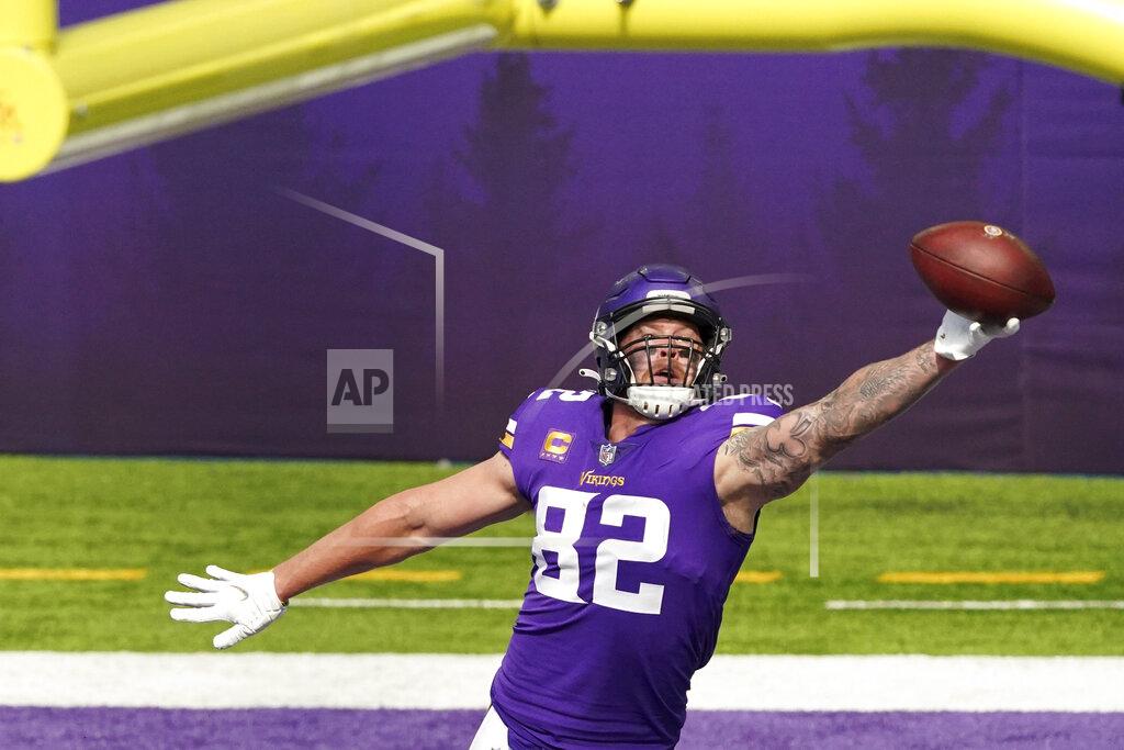 Anthony Souffle Minnesota Vikings tight end Kyle Rudolph (82) made a one-handed touchdown catch during the second half of an NFL football game against the Tennessee Titans, Sunday, Sept. 27, 2020 in Minneapolis. (Anthony Souffle/Star Tribune via AP)