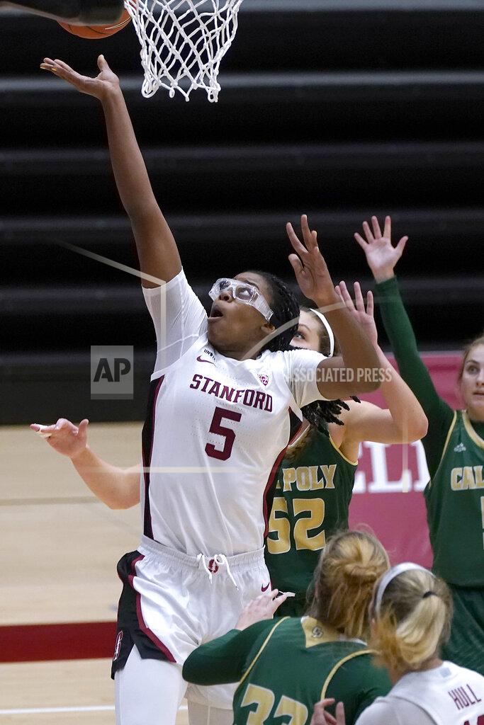Tony Avelar Stanford forward Francesca Belibi (5) drives to the basket against Cal Poly during the first half of an NCAA college basketball game in Stanford, Calif., Wednesday, Nov. 25, 2020. (AP Photo/Tony Avelar)