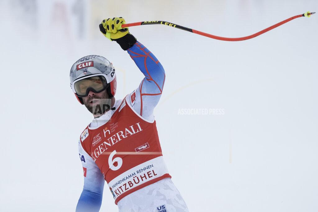 United States' Travis Ganong gets to the finish area after completing an alpine ski, men's World Cup downhill, in Kitzbuehel, Austria, Friday, Jan. 21, 2022. (AP Photo/Giovanni Auletta)