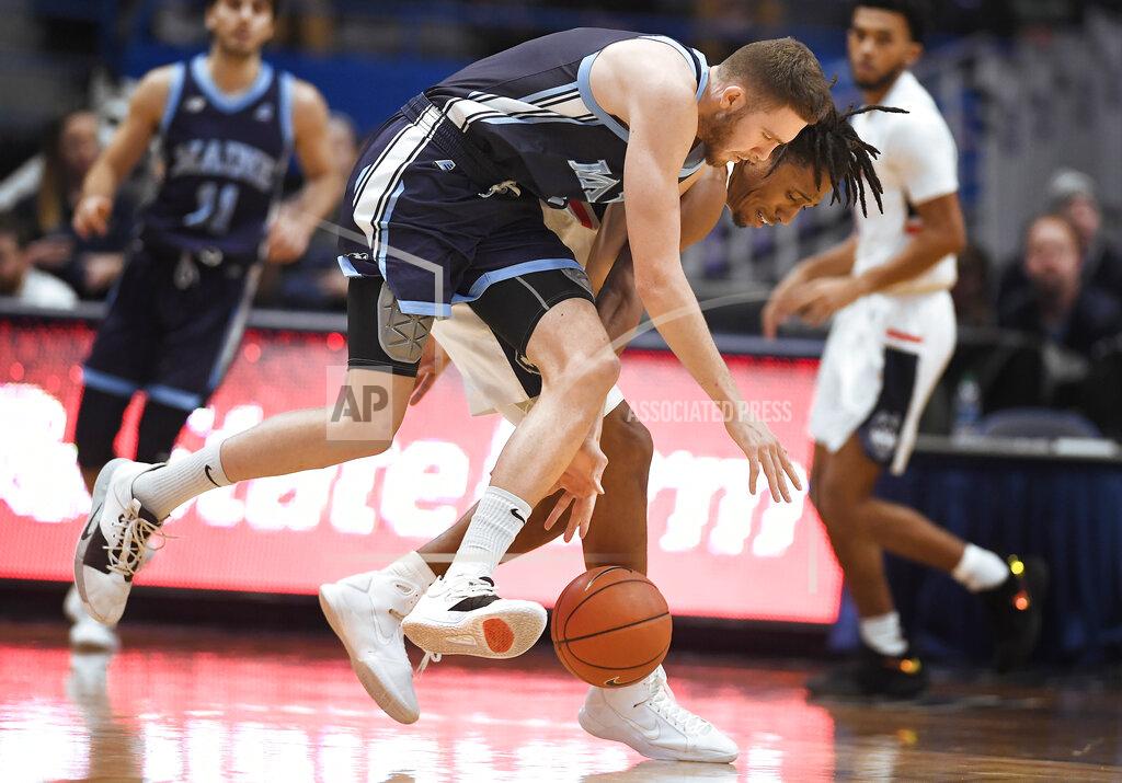 Jessica Hill Maine's Nedeljko Prijovic, left, and Connecticut's Brendan Adams, back right, chase the ball during the second half of an NCAA college basketball game Sunday, Dec. 1, 2019, in Hartford, Conn. (AP Photo/Jessica Hill)
