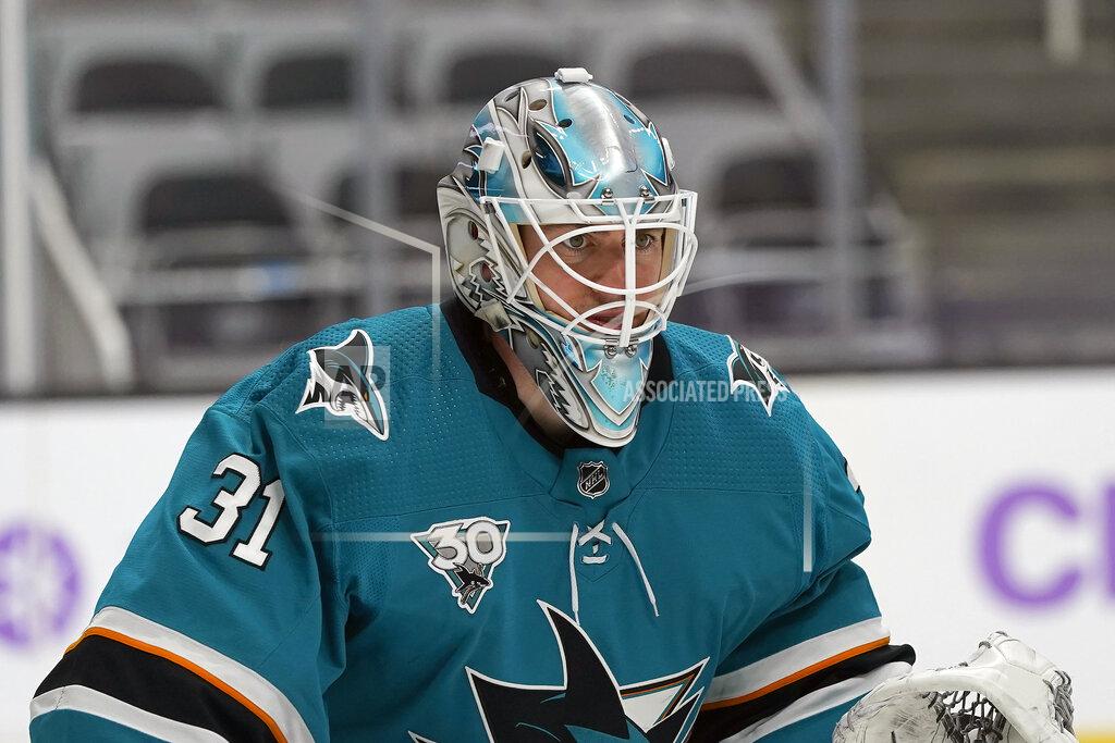 Jeff Chiu FILE - San Jose Sharks goaltender Martin Jones (31) plays against the Colorado Avalanche during an NHL hockey game in San Jose, Calif., in this Monday, May 3, 2021, file photo. Several goaltenders were on the move in NHL free agency Wednesday, July 28, 2021. Martin Jones joined the Philadelphia Flyers. (AP Photo/Jeff Chiu, File)