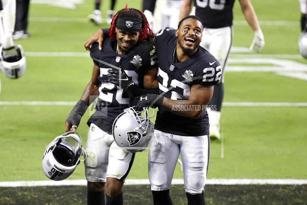 Isaac Brekken Las Vegas Raiders cornerback Damon Arnette, left, and cornerback Keisean Nixon celebrate after defeating the New Orleans Saints in an NFL football game, Monday, Sept. 21, 2020, in Las Vegas. (AP Photo/Isaac Brekken)