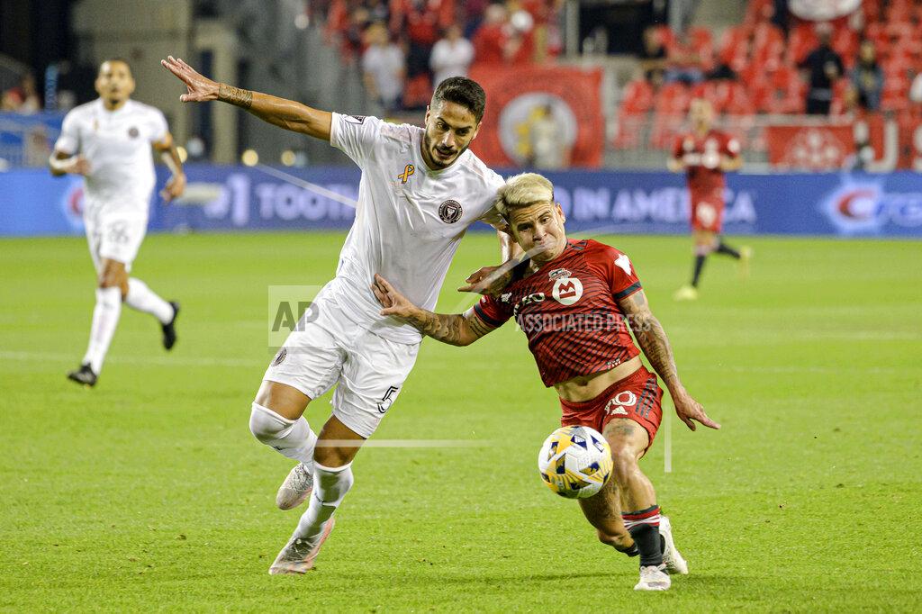 Christopher Katsarov Toronto FC midfielder Yeferson Soteldo, right, and Inter Miami defender Nicolas Figal (5) vie for the ball during the first half of an MLS soccer match Tuesday, Sept. 14, 2021, in Toronto. (Christopher Katsarov/The Canadian Press via AP)