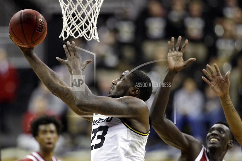 Charlie Riedel Missouri forward Jeremiah Tilmon (23) shoots during the first half of an NCAA college basketball game against Oklahoma, Tuesday, Nov. 26, 2019, in Kansas City, Mo. (AP Photo/Charlie Riedel)