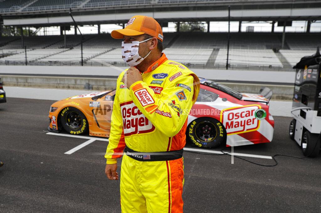 Darron Cummings Ryan Newman waits in the pit area before a NASCAR Cup Series auto race at Indianapolis Motor Speedway in Indianapolis, Sunday, July 5, 2020. (AP Photo/Darron Cummings)