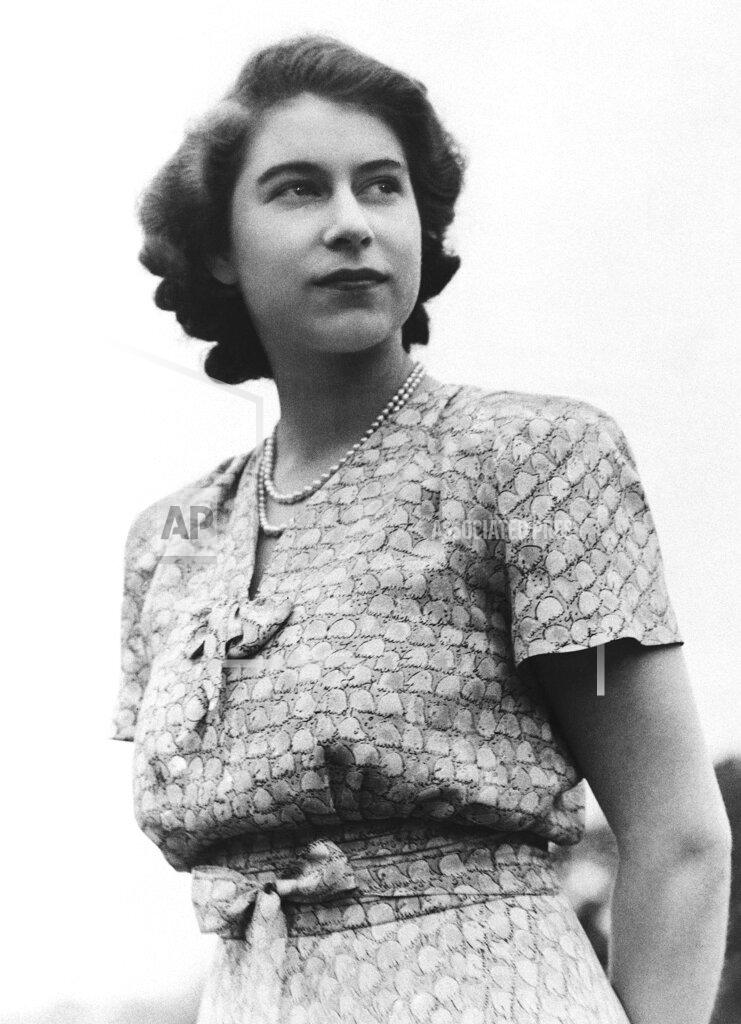 Uncredited FILE - Britain's Princess Elizabeth appears on the grounds of the Royal Lodge at Windsor, England, on Aug. 26, 1946. (AP Photo, File)