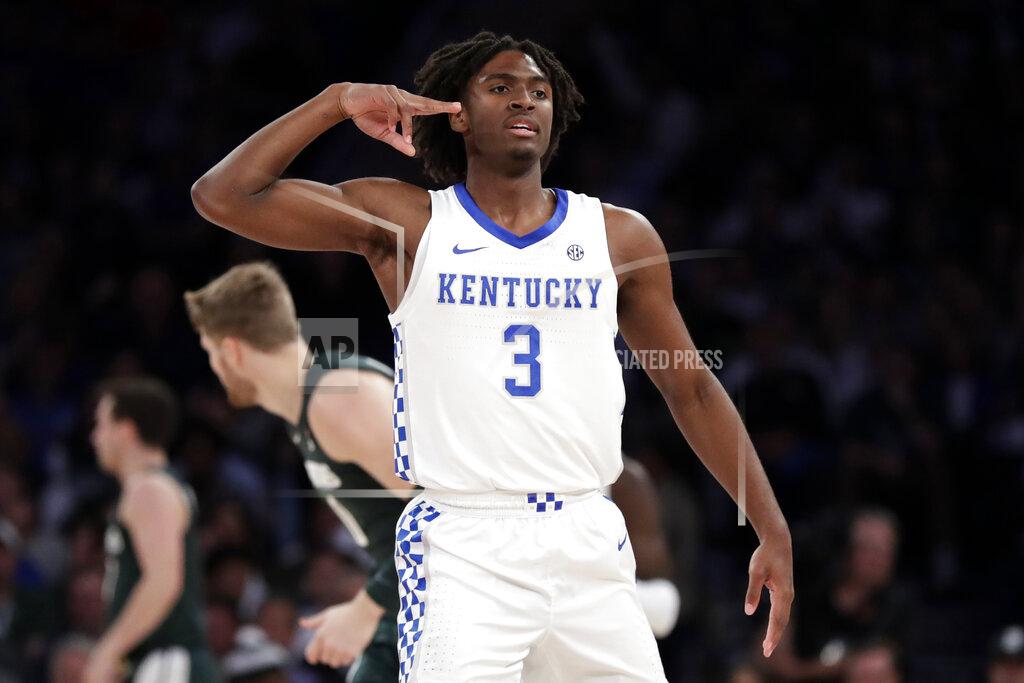Adam Hunger Kentucky guard Tyrese Maxey (3) reacts after making a 3-point basket during the first half of the team's NCAA college basketball game against Michigan State on Tuesday, Nov. 5, 2019, in New York. (AP Photo/Adam Hunger)