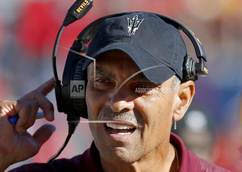 Rick Scuteri FILE - In this Nov. 24, 2018, file photo, Arizona State head coach Herm Edwards watches during an NCAA college football game against Arizona in Tucson, Ariz. Edwards is adding a new title at Arizona State: Professor. The school announced Thursday, June 13, 2019, that the Arizona State head football coach will become a professor of practice at the Walter Cronkite School of Journalism and Mass Communication. (AP Photo/Rick Scuteri, File)