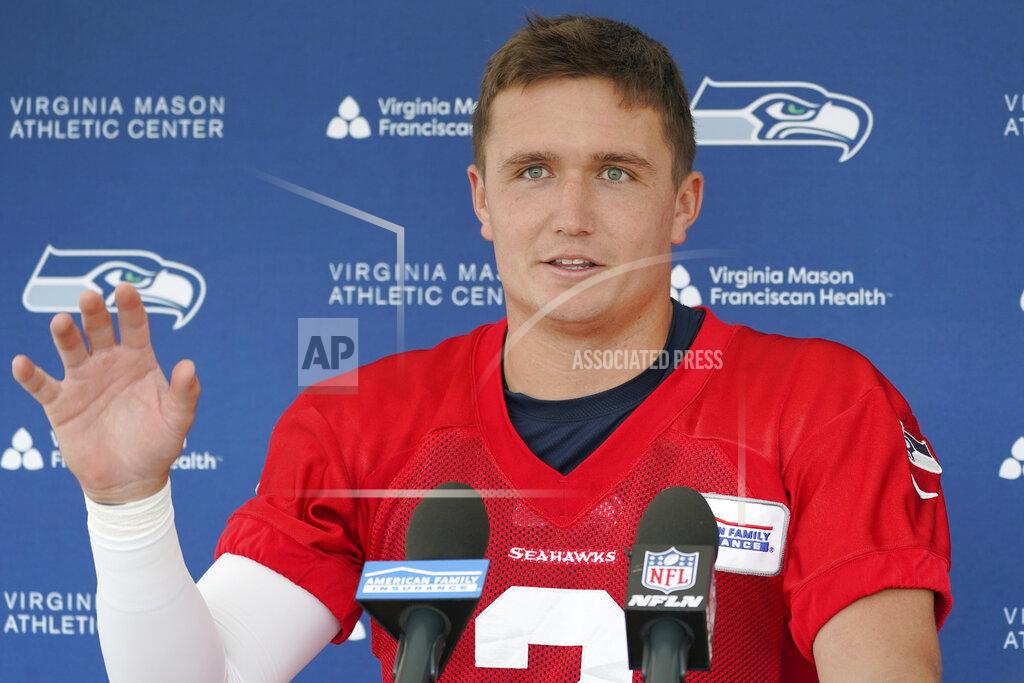 Seattle Seahawks quarterback Drew Lock talks to reporters after NFL football practice Monday, Aug. 1, 2022, in Renton, Wash. (AP Photo/Ted S. Warren)