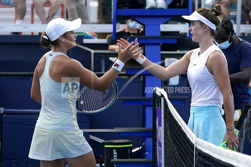 Lynne Sladky Ashleigh Barty, left, of Australia, and Elina Svitolina, of Ukraine, meet at the net after their semifinal at the Miami Open tennis tournament Thursday, April 1, 2021, in Miami Gardens, Fla. Barty won 6-3, 6-3. (AP Photo/Lynne Sladky)