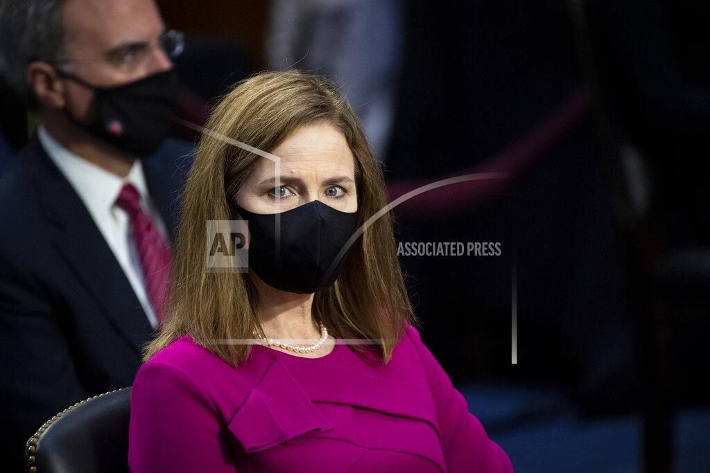 Caroline Brehman Supreme Court nominee Amy Coney Barrett listens during her Senate Judiciary Committee confirmation hearing on Capitol Hill in Washington, Monday, Oct. 12, 2020. (Caroline Brehman/Pool via AP)