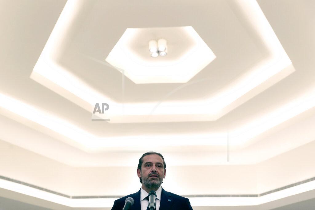Bilal Hussein Lebanese Prime Minister-Designate Saad Hariri, speaks to journalists after his meeting with Lebanese President Michel Aoun, at the Presidential Palace in Baabda, east of Beirut, Lebanon, Thursday, March 18, 2021. Hariri said despite disagreements with the country's president there is still a chance to form a government to halt economic collapse and offer people hope. (AP Photo/Bilal Hussein)