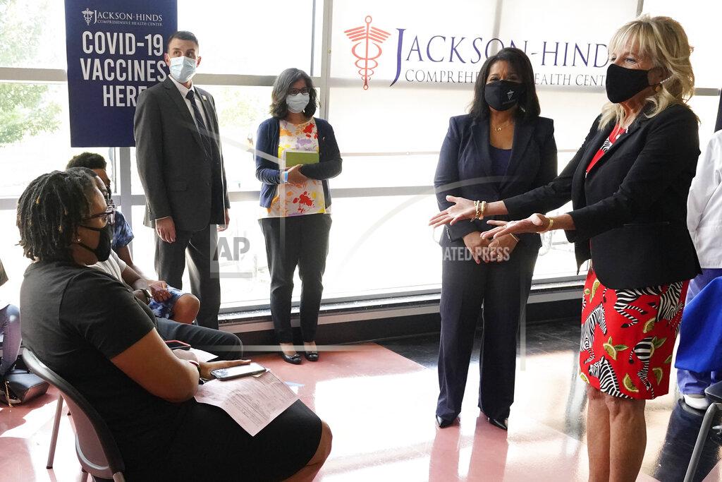Rogelio V. Solis First lady Jill Biden, right, and Jackson-Hinds Comprehensive Health Center CEO Jasmin Chapman speak to recently vaccinated patients during a visit to a COVID-19 vaccination site at Jackson State University in Jackson, Miss., Tuesday, June 22, 2021, as part of Biden administration's nationwide tour to reach Americans who haven't been vaccinated and to promote vaccine education. (AP Photo/Rogelio V. Solis)