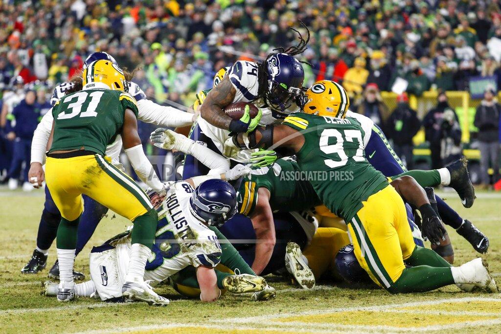 Matt Ludtke Seattle Seahawks' Marshawn Lynch runs for a touchdown during the second half of an NFL divisional playoff football game against the Green Bay Packers Sunday, Jan. 12, 2020, in Green Bay, Wis. (AP Photo/Matt Ludtke)