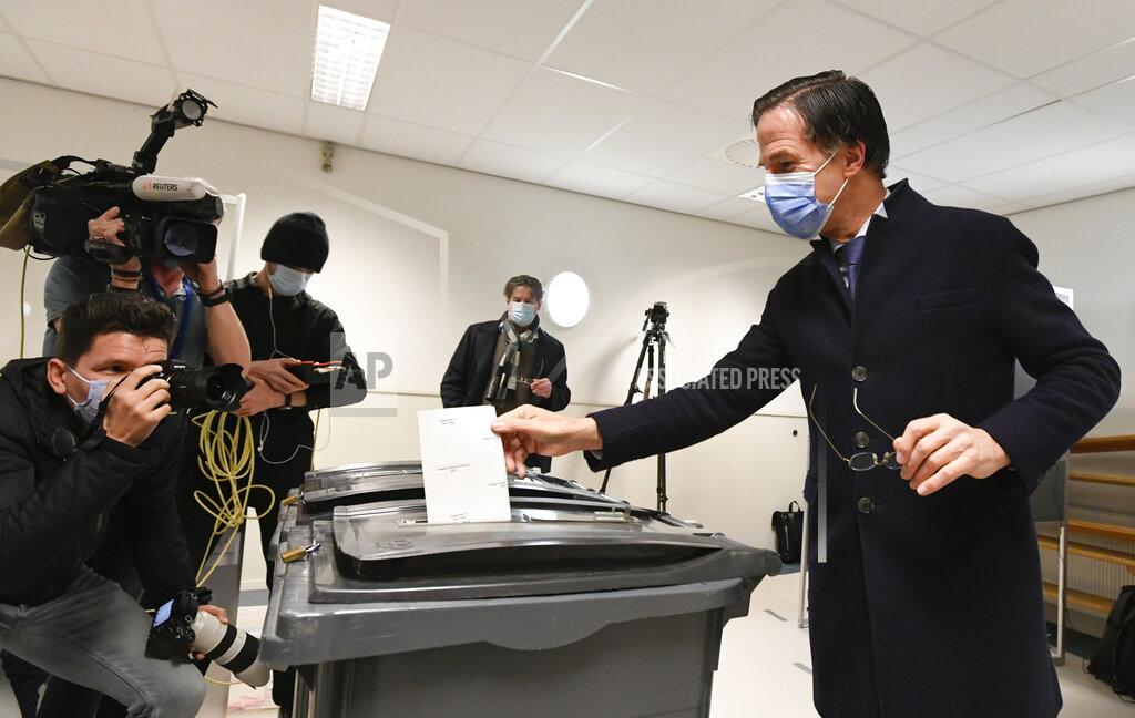 Piroschka Van De Wouw Dutch caretaker Prime Minister Mark Rutte of the VVD Liberal party votes in the Dutch general election in The Hague, Netherlands, March 17, 2021. (Piroschka Van De Wouw/Pool via AP)