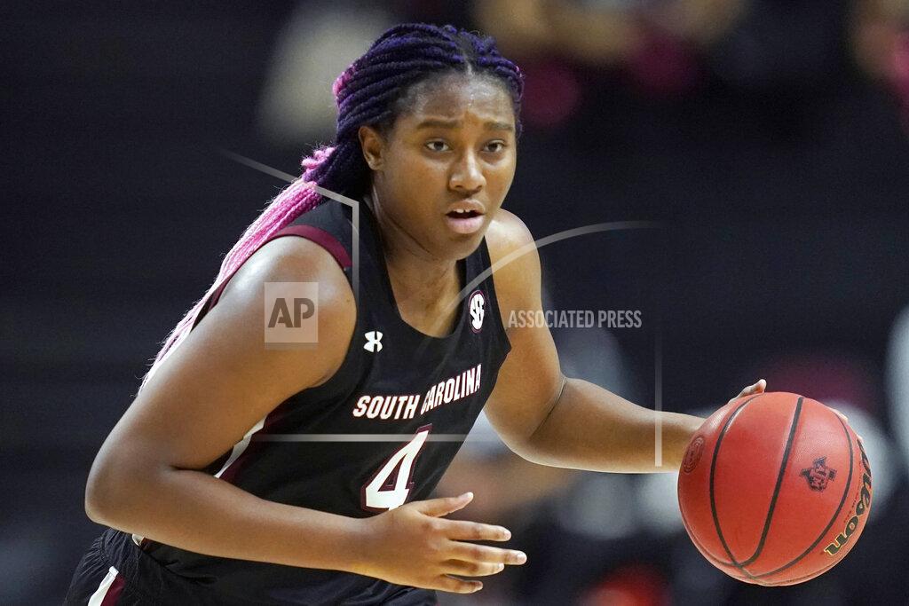 Sam Craft FILE - South Carolina forward Aliyah Boston (4) brings the ball down against Texas A&M during the first half of an NCAA college basketball game in College Station, Texas, in this Sunday, Feb. 28, 2021, file photo. Boston was named to the preseason Associated Press NCAA college basketball All-America team on Tuesday, Oct. 26, 2021.(AP Photo/Sam Craft, File)