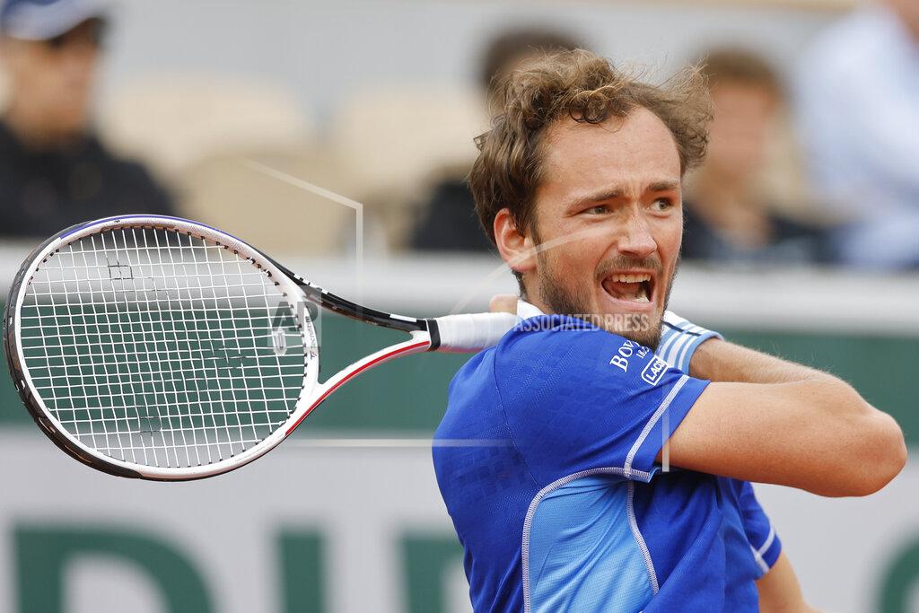 Jean-Francois Badias Russia's Daniil Medvedev plays a shot against Argentina's Facundo Bagnis during their first round match at the French Open tennis tournament in Roland Garros stadium in Paris, France, Tuesday, May 24, 2022. (AP Photo/Jean-Francois Badias)