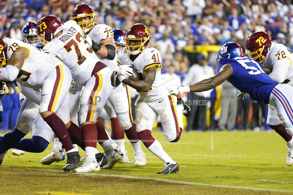 Patrick Semansky Washington Football Team running back J.D. McKissic (41) scores a touchdown against the New York Giants during the first half of an NFL football game, Thursday, Sept. 16, 2021, in Landover, Md. (AP Photo/Patrick Semansky)