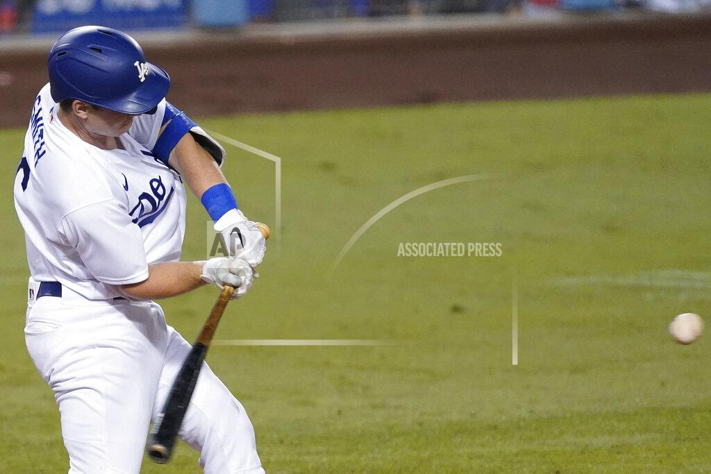 Ashley Landis Los Angeles Dodgers' Will Smith hits a home run during the fifth inning of the team's baseball game against the Los Angeles Angels on Friday, Sept. 25, 2020, in Los Angeles. (AP Photo/Ashley Landis)