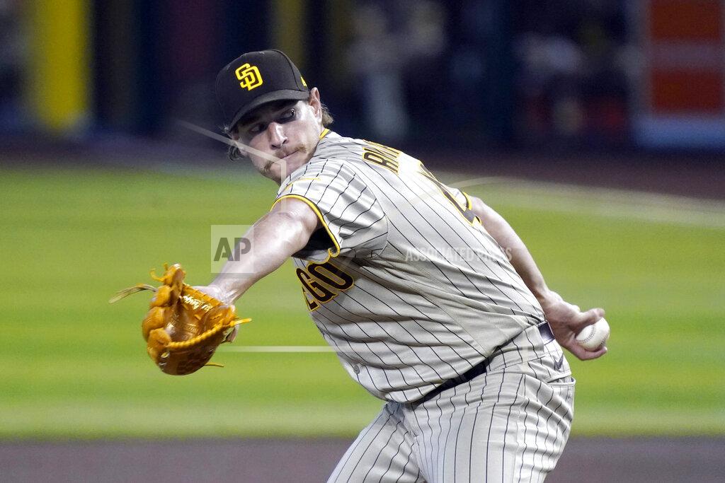Rick Scuteri San Diego Padres pitcher Garrett Richards throws against the Arizona Diamondbacks in the first inning during a baseball game, Sunday, Aug 16, 2020, in Phoenix. (AP Photo/Rick Scuteri)