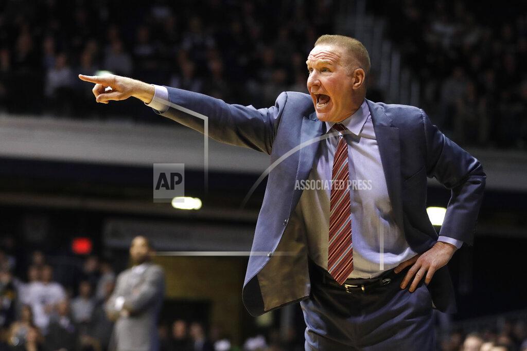 Darron Cummings FILE - In this Jan. 19, 2019, file photo, St. John's coach Chris Mullin shouts during the second half of the team's NCAA basketball game against Butler, in Indianapolis. Mullin felt in his heart that it was time to move on from St. John’s. Mullin stepped down as coach of the school he starred at as a player in the 1980s earlier this month after four years on the job. (AP Photo/Darron Cummings, File)