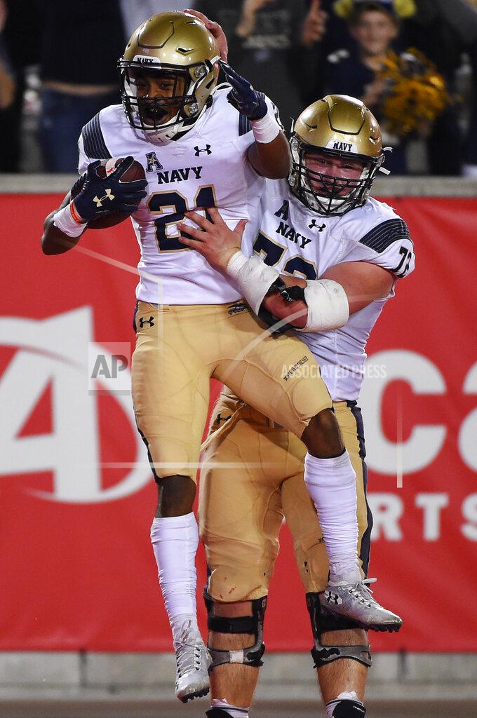 Eric Christian Smith Navy wide receiver Tyreek King-El, left, celebrates his touchdown with Ford Higgins during the second half of an NCAA college football game against Houston, Saturday, Nov. 30, 2019, in Houston. (AP Photo/Eric Christian Smith)