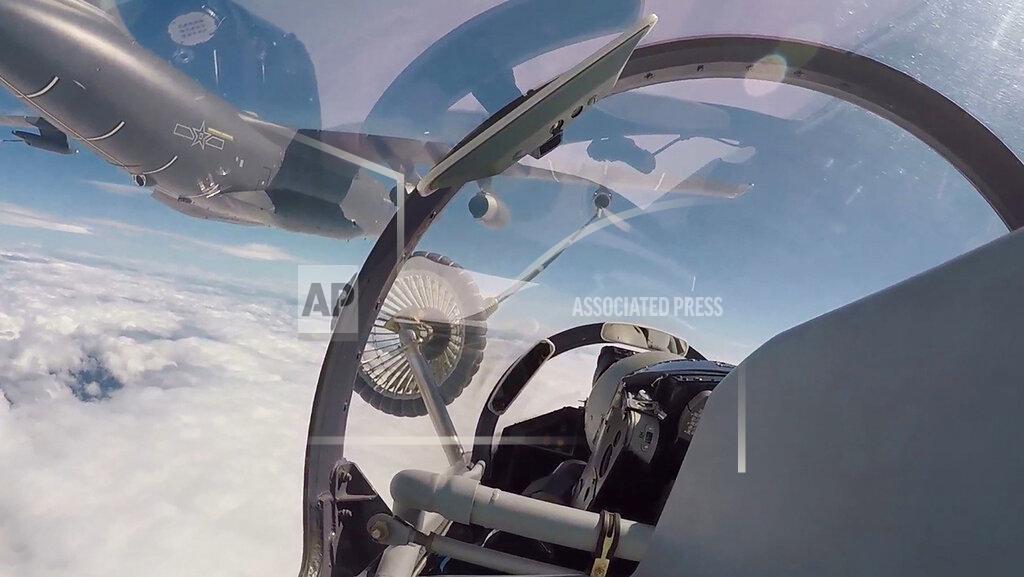 Uncredited In this image made from video and released by China's Xinhua News Agency, the air force and naval aviation corps of the Eastern Theater Command of the Chinese People's Liberation Army (PLA) conducts aerial refueling at an unspecified location in China, Thursday, Aug. 4, 2022. China conducted "precision missile strikes" Thursday in waters off Taiwan's coasts as part of military exercises that have raised tensions in the region to their highest level in decades following a visit by U.S. House Speaker Nancy Pelosi. (Xinhua via AP)