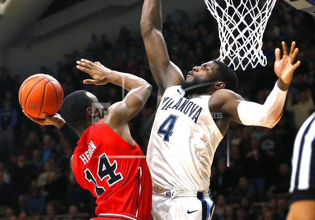 Booth rallies champion Wildcats past No. 24 St. John's