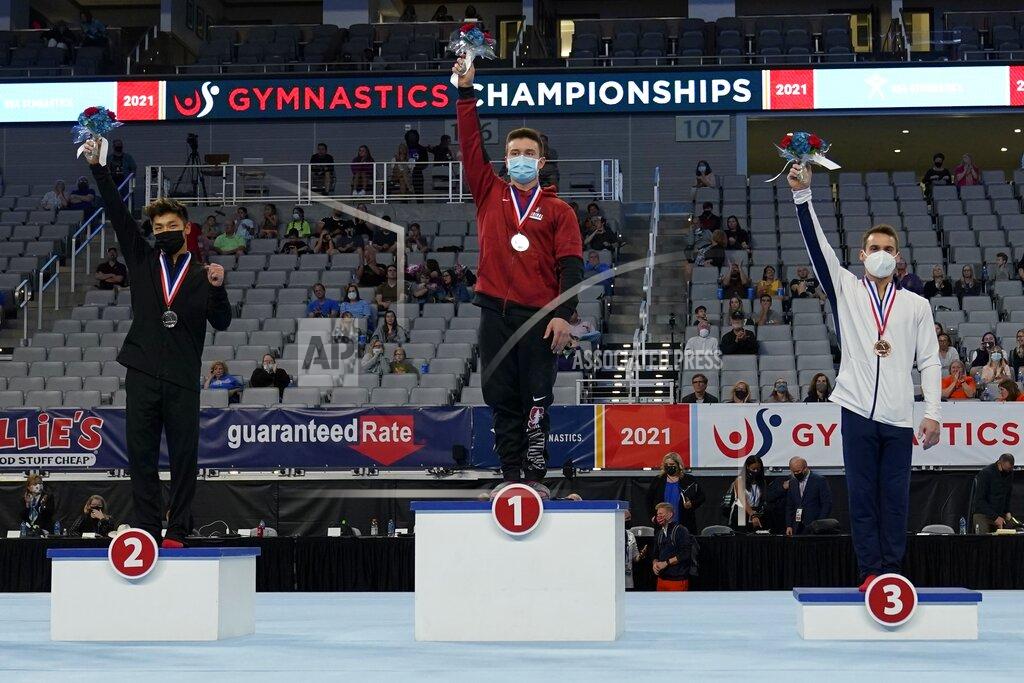 Tony Gutierrez From left to right, Yul Moldauer, Brody Malone and Sam Mikulak stand on their respective podiums after finishing in the top three positions during the U.S. Gymnastics Championships, Saturday, June 5, 2021, in Fort Worth, Texas. (AP Photo/Tony Gutierrez)