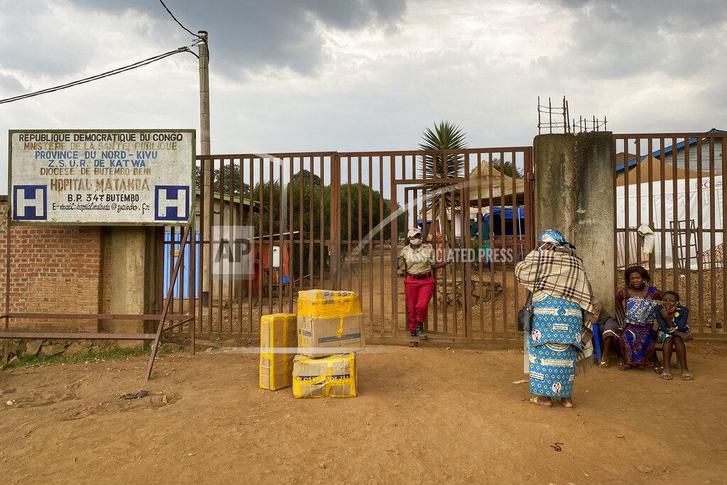 The gates of the Matanda Hospital in Butembo, where the first case of Ebola died, in the North Kivu province of Congo Thursday, Feb. 11, 2021. A second case and death of Ebola has been recorded in Congo's North Kivu province after a 60-year-old woman died Wednesday, according to officials. (AP Photo/Al-hadji Kudra Maliro)