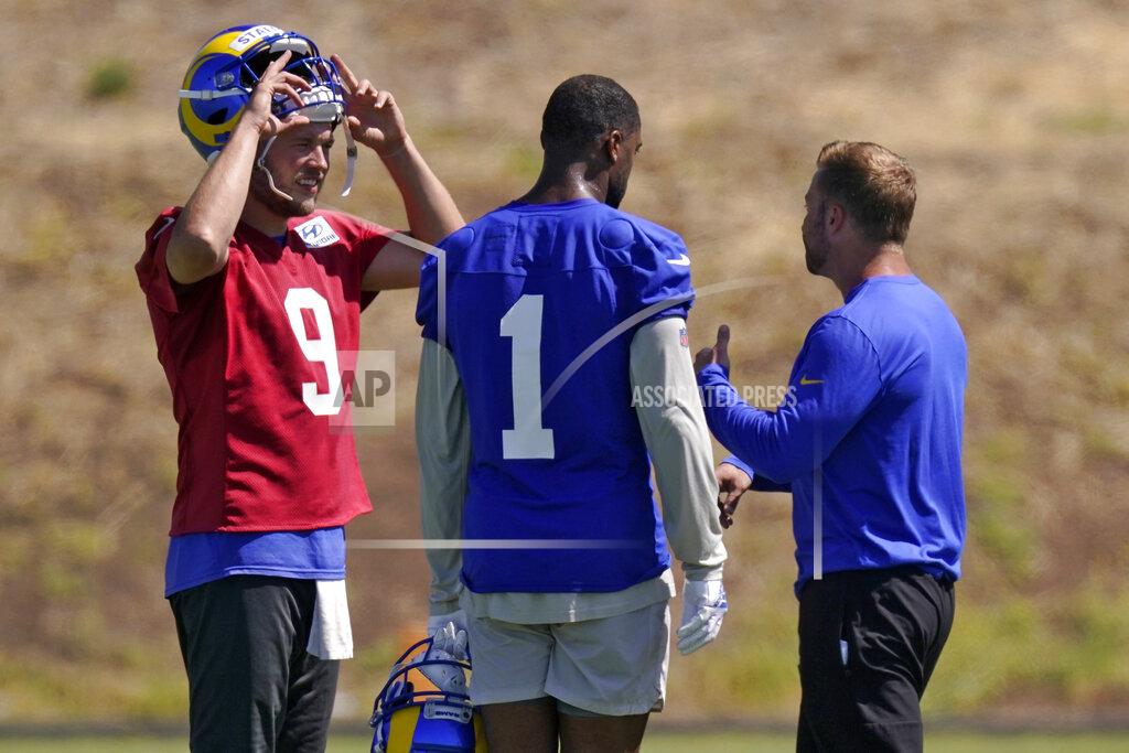 Mark J. Terrill Los Angeles Rams quarterback Matthew Stafford, left, talks with wide receiver Allen Robinson II, center, and head coach Sean McVay during an NFL mini camp football practice Tuesday, June 7, 2022, in Thousand Oaks, Calif. (AP Photo/Mark J. Terrill)