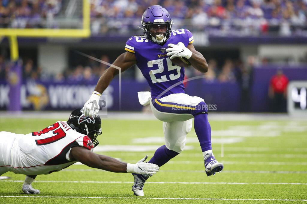 Bruce Kluckhohn Minnesota Vikings running back Alexander Mattison (25) breaks a tackle by Atlanta Falcons defensive tackle Grady Jarrett, left, during the first half of an NFL football game Sunday, Sept. 8, 2019, in Minneapolis. (AP Photo/Bruce Kluckhohn)