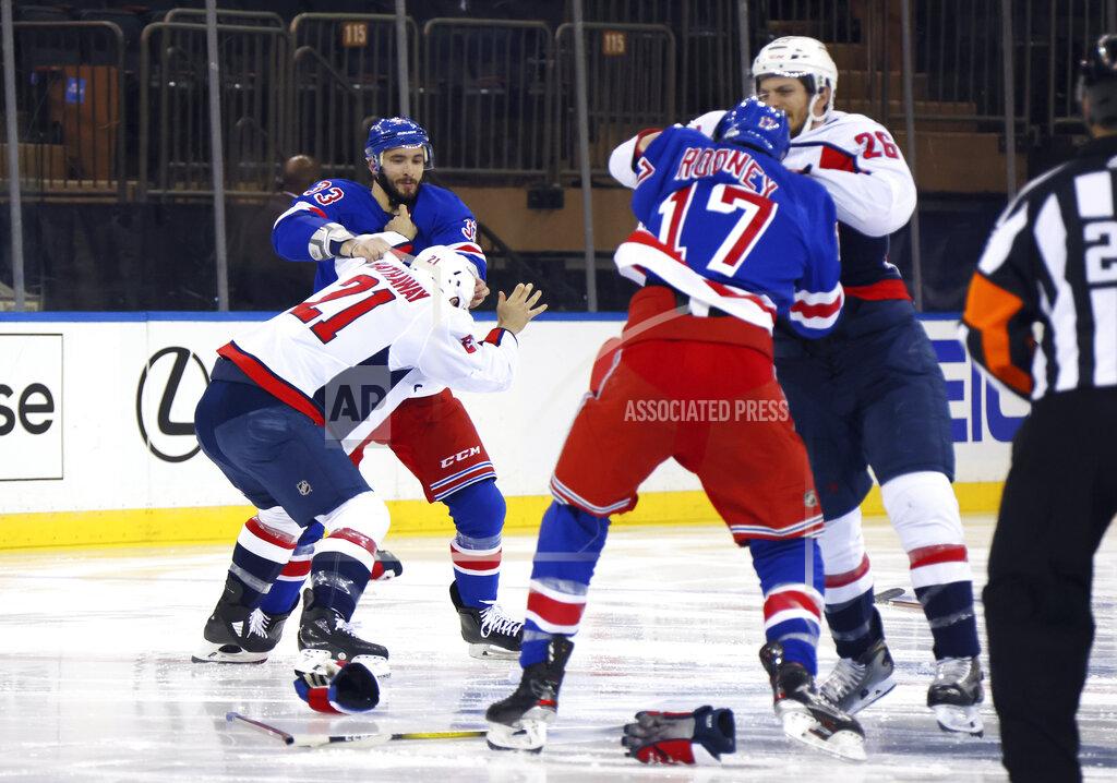 Bruce Bennett Washington Capitals and New York Rangers fight in the opening seconds of an NHL hockey game Wednesday, May 5, 2021, in New York. (Bruce Bennett/Pool Photo via AP)