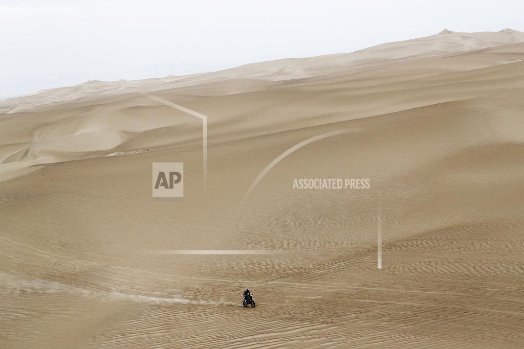 Ricardo Mazalan Xavier De Soultrait of France rides his Yamaha motorbike during the first stage of the Dakar Rally between Lima and Pisco, Peru, Monday, Jan. 7, 2019. (AP Photo/Ricardo Mazalan)