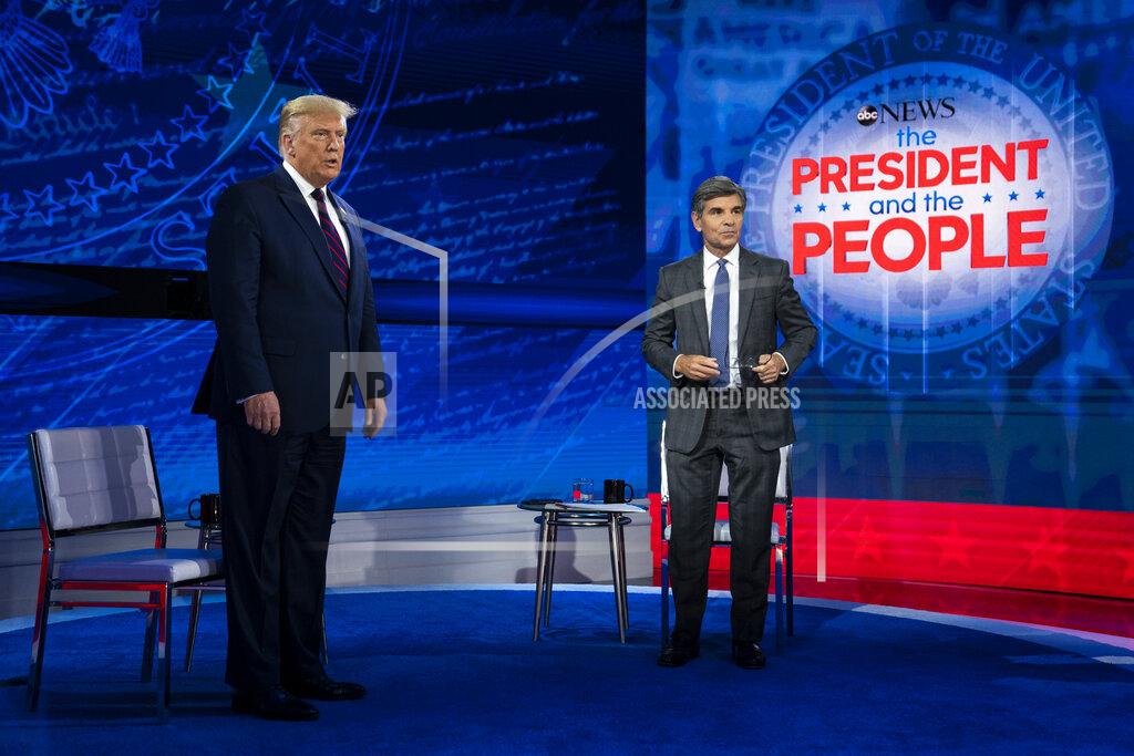 Evan Vucci President Donald Trump talks with ABC News anchor George Stephanopoulos before a town hall at National Constitution Center, Tuesday, Sept. 15, 2020, in Philadelphia. (AP Photo/Evan Vucci)