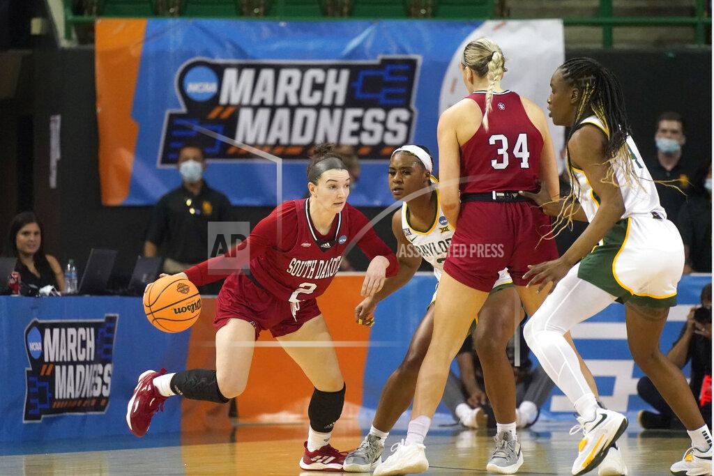 Lm Otero South Dakota guard Liv Korngable (2) uses a screen from teammate center Hannah Sjerven (34) against Baylor guard Jordan Lewis (3) and center Queen Egbo (4) during the first half of a college basketball game in the second round of the NCAA tournament in Waco, Texas, Sunday, March 20, 2022. (AP Photo/LM Otero)