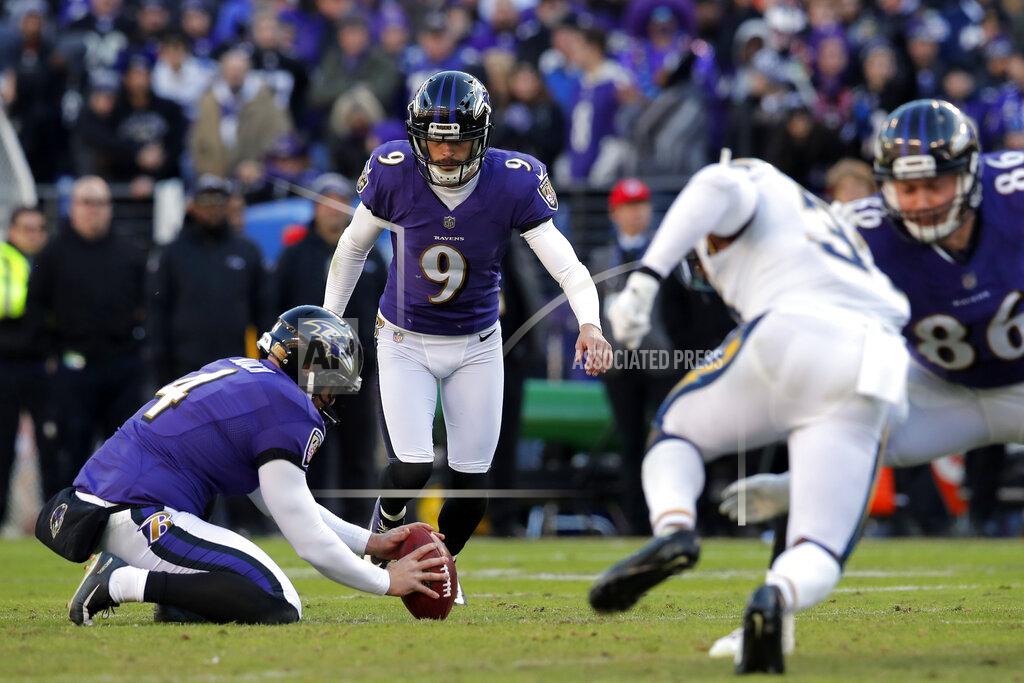 FILE - In this Sunday, Jan. 6, 2019 file photo, Baltimore Ravens kicker Justin Tucker (9) kicks an unsuccessful field goal attempt in the second half of an NFL wild card playoff football game against the Los Angeles Chargers in Baltimore. If the offense stalls, Justin Tucker can be counted on the deliver a long-distance field goal. Tucker has an NFL-record 90.1% accuracy rate on 3-pointers and is the first kicker to produce six seasons with at least 30 field goals.(AP Photo/Carolyn Kaster, File)