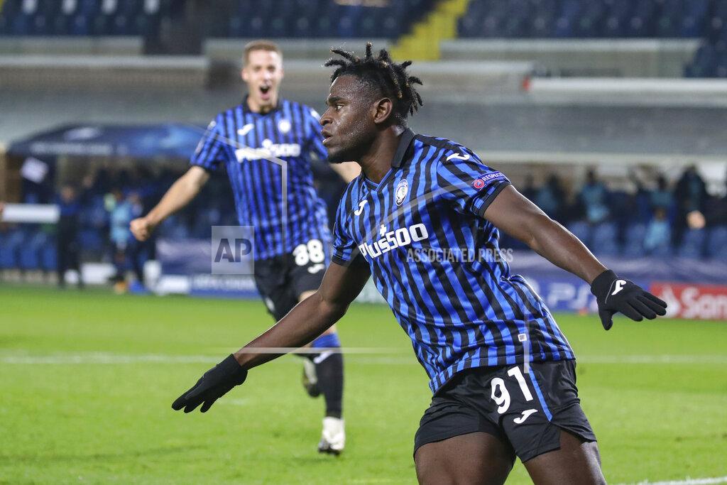 Stefano Nicoli Atalanta's Duvan Zapata celebrates after scoring during the Champions League, group D soccer match between Atalanta and Ajax, at the Gewiss Stadium in Bergamo, Italy, Tuesday, Oct. 27, 2020. (Stefano Nicoli/LaPresse via AP)