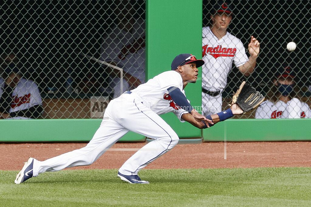 Ron Schwane Cleveland Indians' Greg Allen makes a diving catch during the seventh inning of a baseball game, Sunday, Aug. 23, 2020, in Cleveland. (AP Photo/Ron Schwane)