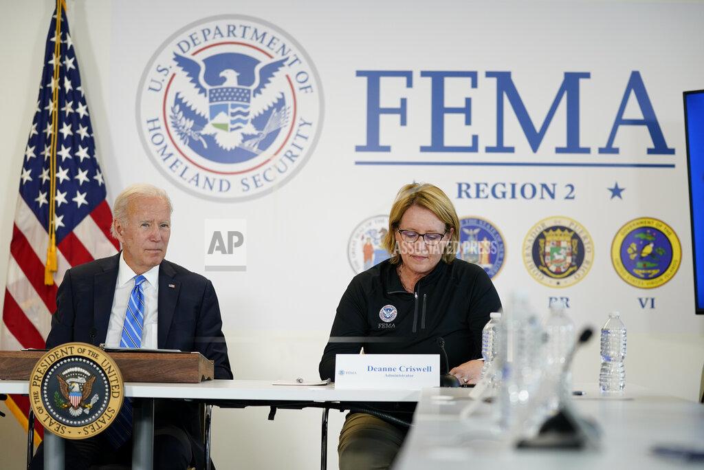 Evan Vucci Federal Emergency Management Agency administrator Deanne Criswell, right, speaks as President Joe Biden visits the FEMA Region 2 office in New York, Thursday, Sept. 22, 2022. (AP Photo/Evan Vucci)