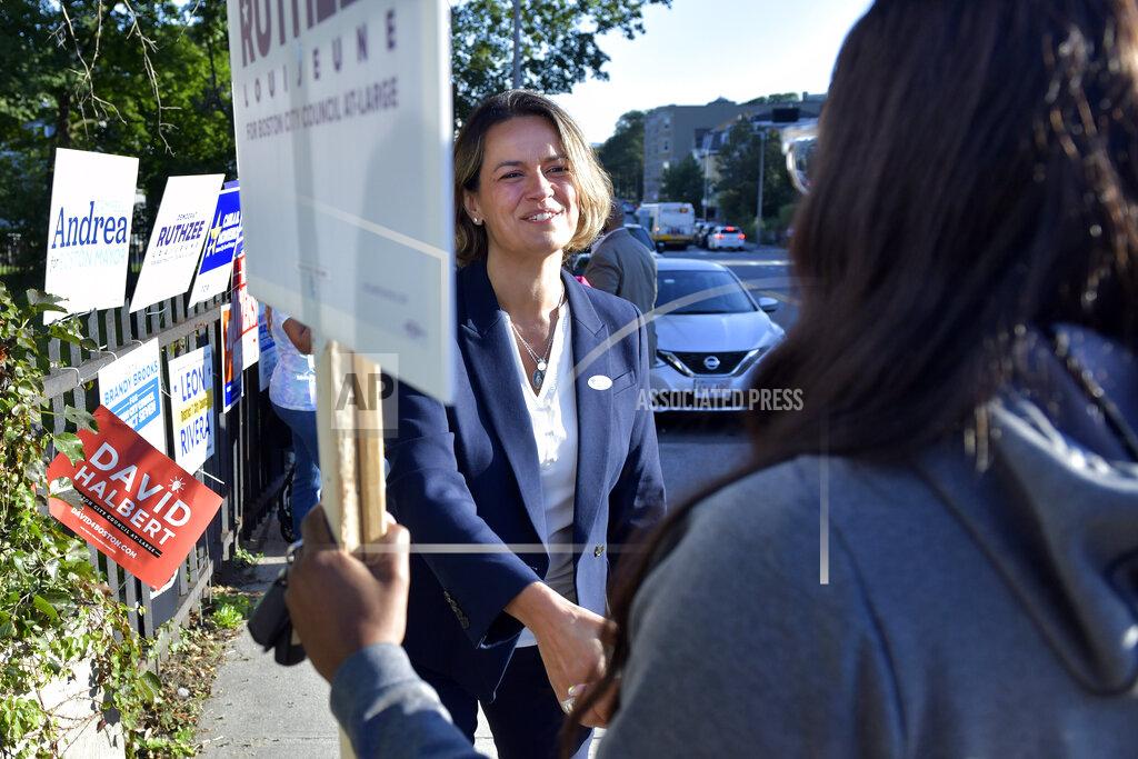 Josh Reynolds Mayoral Candidate City Councilor Annissa Essaibi George greets campaigners outside a polling place in the Roxbury neighborhood of Boston on Tuesday, Sept. 14, 2021 in a preliminary mayoral election that will select two top contenders from a field of five candidates all of whom are people of color, four of them women. (AP Photo/Josh Reynolds)