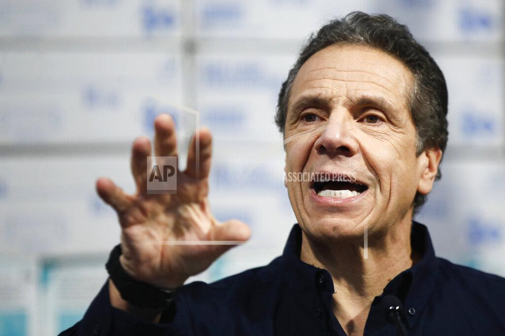 John Minchillo FILE- In this March 24, 2020, file photo, New York Gov. Andrew Cuomo speaks during a news conference at the Jacob Javits Center in New York. With New York City at the epicenter of the coronavirus outbreak in the U.S. and its native-born among those offering crucial information to the nation in televised briefings, the New York accent has stepped up to the mic. Cuomo's news conferences have become must-see TV. (AP Photo/John Minchillo, File)
